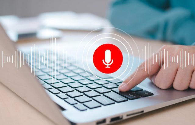 Voice search optimization concept with keyboard and microphone icon.